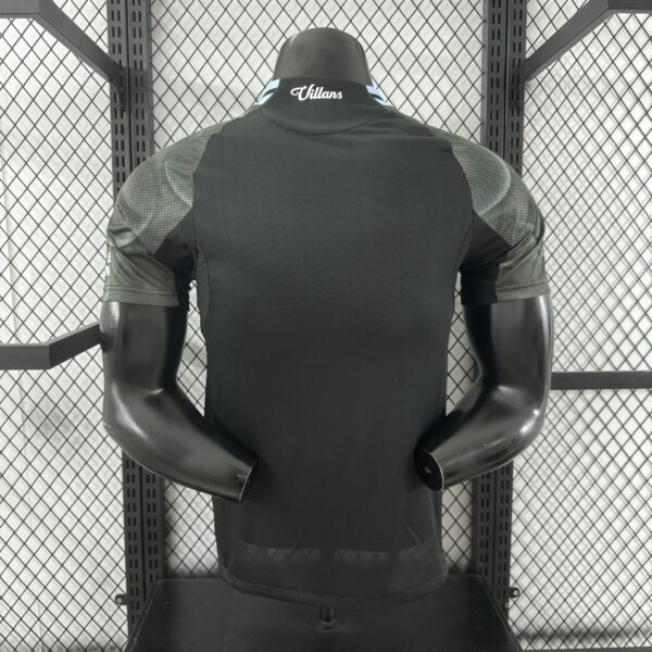 0e23ea8b Aston Villa 25/26 Visitante Negra Player Versión