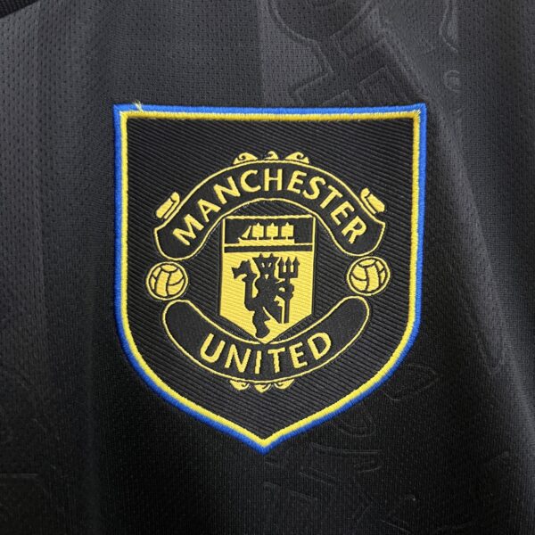 Manchester United 25/26 Visitante Negra
